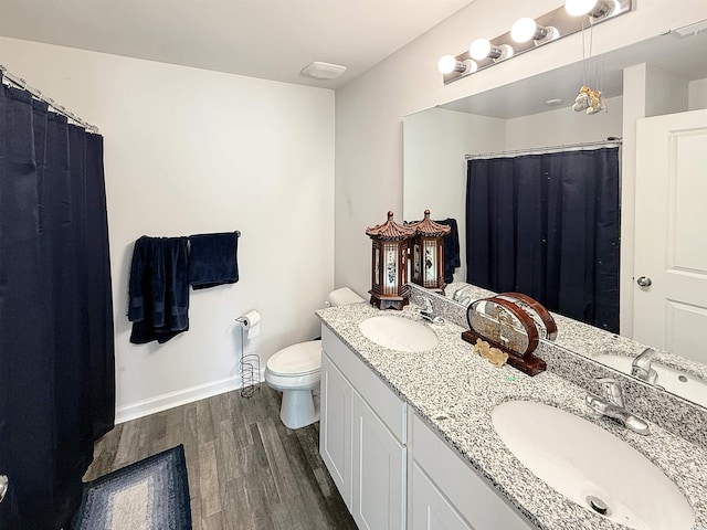 2021 Loblolly St, Georgetown, SC 29440 - bathroom featuring wood finished floors, double vanity, and a shower with shower curtain