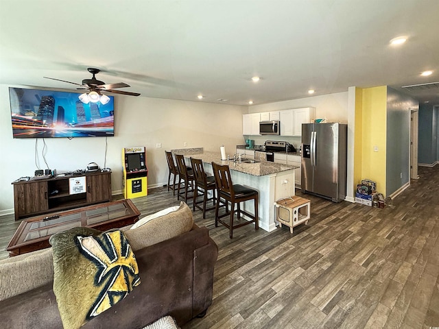 2021 Loblolly St, Georgetown, SC 29440 - living room featuring dark wood-style floors, recessed lighting, and a ceiling fan