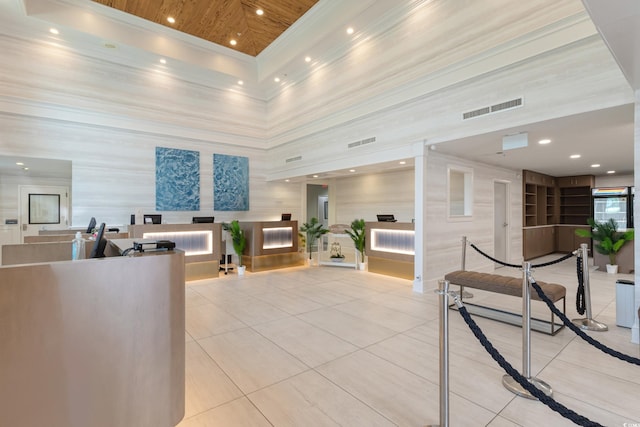 3000 N Ocean Blvd N Unit 1532, Myrtle Beach, SC 29577 - building lobby with a towering ceiling, ornamental molding, and recessed lighting