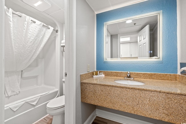 3000 N Ocean Blvd N Unit 1532, Myrtle Beach, SC 29577 - full bathroom with a textured wall, vanity, shower / bath combination with curtain, and wood finished floors