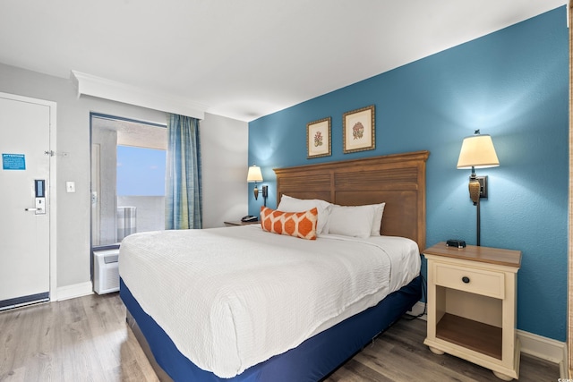 3000 N Ocean Blvd N Unit 1532, Myrtle Beach, SC 29577 - bedroom featuring wood finished floors and access to exterior
