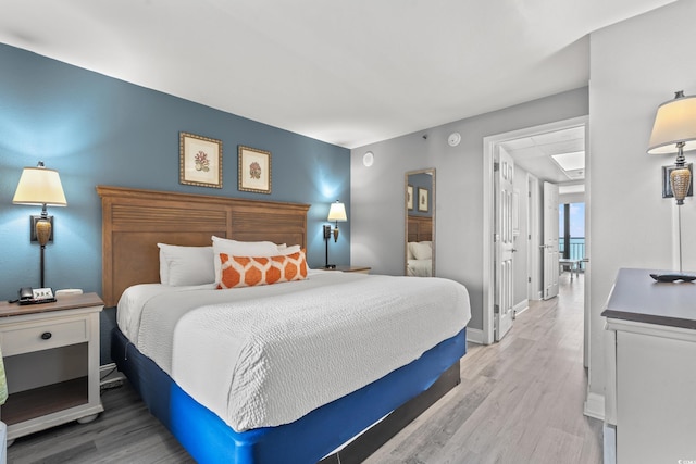 3000 N Ocean Blvd N Unit 1532, Myrtle Beach, SC 29577 - bedroom with light wood-type flooring and baseboards