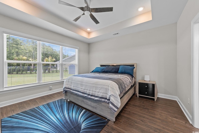 2212 Leeboard Ct, Myrtle Beach, SC 29579 - bedroom with wood finished floors, a raised ceiling, ceiling fan, and recessed lighting