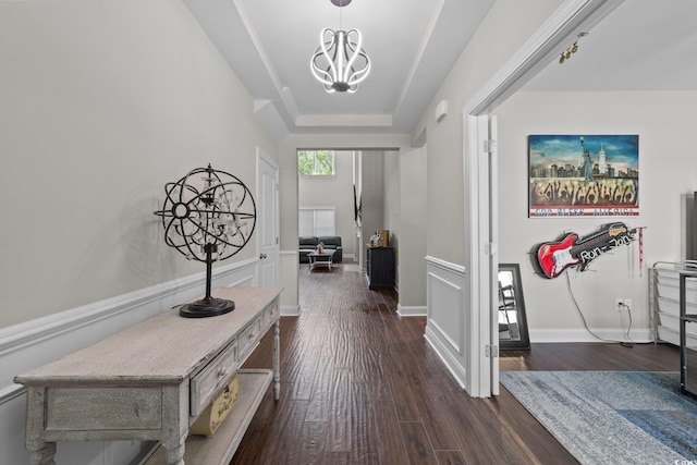 2212 Leeboard Ct, Myrtle Beach, SC 29579 - hall featuring a chandelier, dark wood finished floors, and a tray ceiling