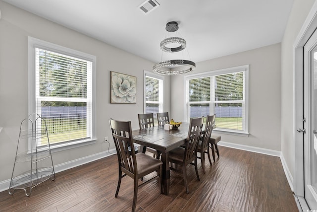 2212 Leeboard Ct, Myrtle Beach, SC 29579 - dining room with healthy amount of natural light and dark wood-type flooring
