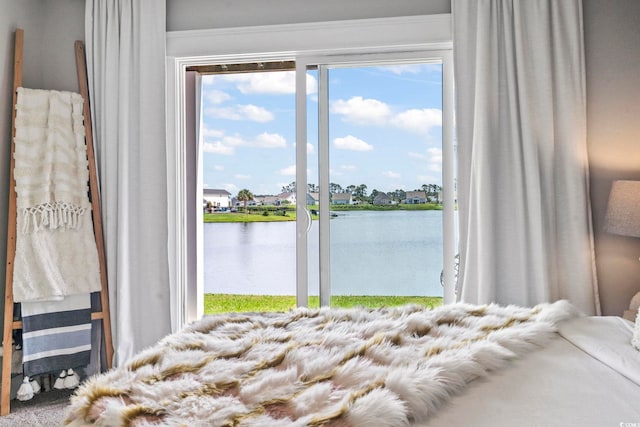 1048 Meadowoods Dr, Murrells Inlet, SC 29576 - bedroom featuring access to outside, a water view, and a residential view