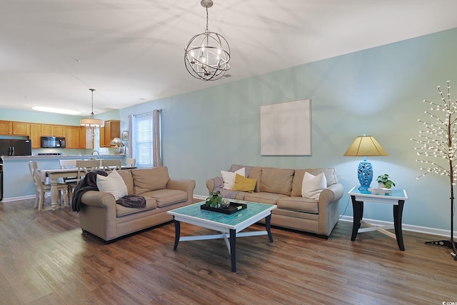 6253 Catalina Dr Unit 1711, North Myrtle Beach, SC 29582 - living room featuring wood finished floors and a chandelier