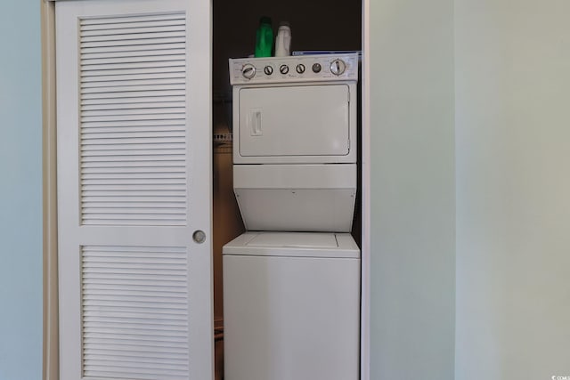 6253 Catalina Dr Unit 1711, North Myrtle Beach, SC 29582 - laundry room featuring stacked washing machine and dryer