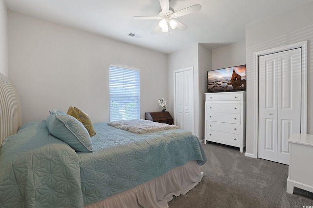 6253 Catalina Dr Unit 1711, North Myrtle Beach, SC 29582 - bedroom with multiple closets, dark colored carpet, and ceiling fan