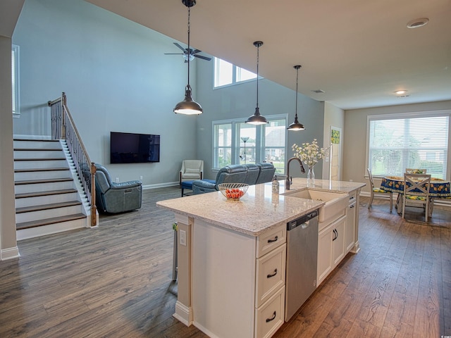 376 Mikita Dr, Surfside Beach, SC 29575 - kitchen with dishwasher, dark wood-style flooring, white cabinetry, a center island with sink, and open floor plan