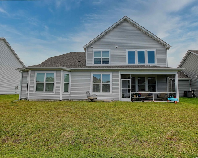 376 Mikita Dr, Surfside Beach, SC 29575 - back of property with a yard, outdoor lounge area, and a shingled roof