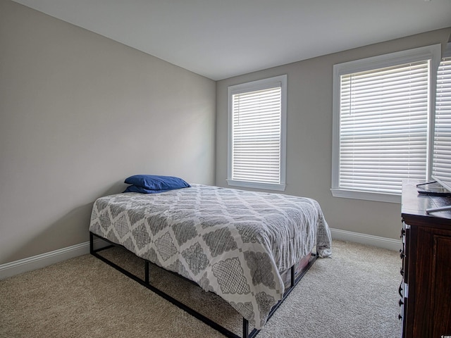 376 Mikita Dr, Surfside Beach, SC 29575 - carpeted bedroom with baseboards