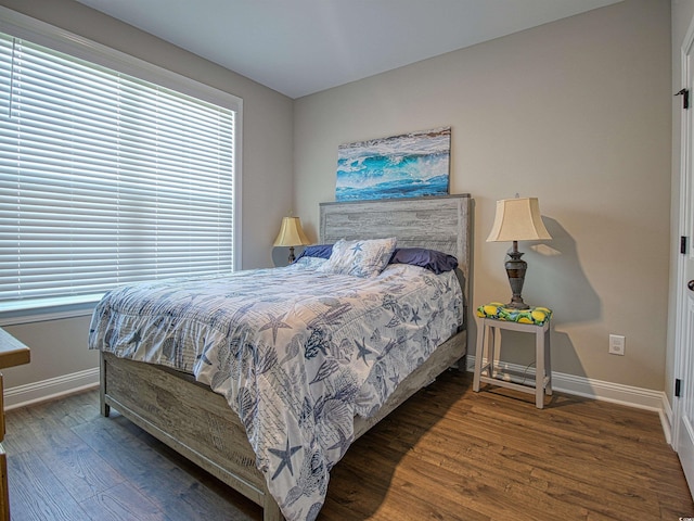 376 Mikita Dr, Surfside Beach, SC 29575 - bedroom featuring baseboards and wood finished floors