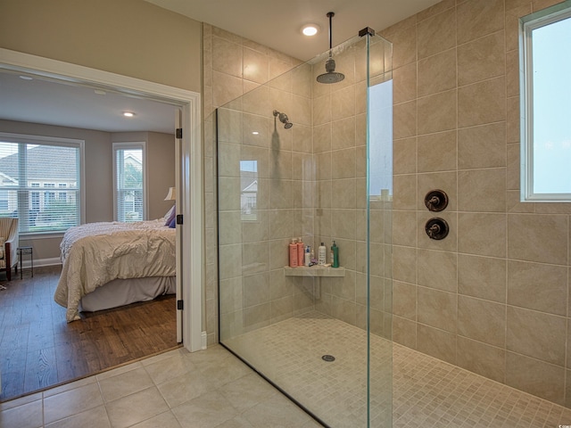 376 Mikita Dr, Surfside Beach, SC 29575 - ensuite bathroom featuring a walk in shower, tile patterned floors, and recessed lighting