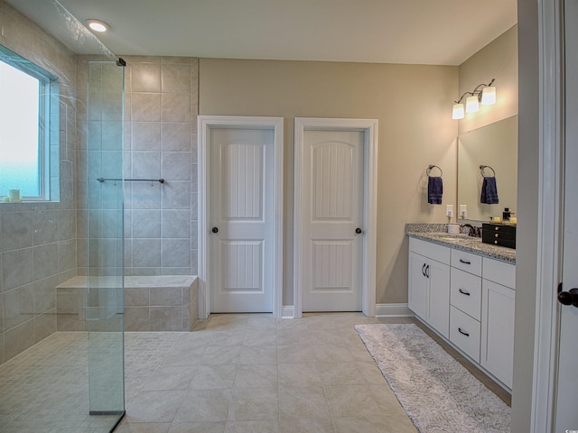 376 Mikita Dr, Surfside Beach, SC 29575 - bathroom featuring vanity, walk in shower, and tile patterned floors