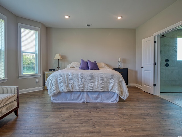 376 Mikita Dr, Surfside Beach, SC 29575 - bedroom featuring multiple windows, wood finished floors, and recessed lighting