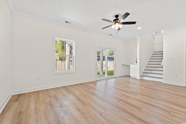 2428 Park St, North Myrtle Beach, SC 29582 - unfurnished living room featuring stairway, ceiling fan, light wood-style floors, ornamental molding, and recessed lighting