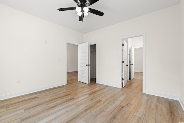 2428 Park St, North Myrtle Beach, SC 29582 - unfurnished bedroom with light wood finished floors, a closet, and ceiling fan