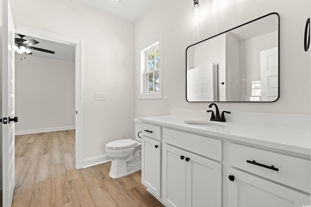 2428 Park St, North Myrtle Beach, SC 29582 - bathroom featuring vanity, wood finished floors, and ceiling fan