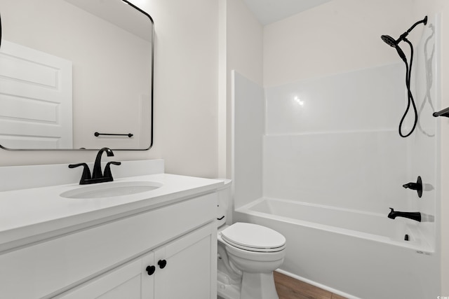 2428 Park St, North Myrtle Beach, SC 29582 - bathroom featuring vanity, washtub / shower combination, and wood finished floors