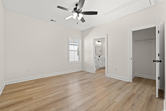 2428 Park St, North Myrtle Beach, SC 29582 - unfurnished bedroom featuring attic access, light wood-style flooring, a closet, and ensuite bath