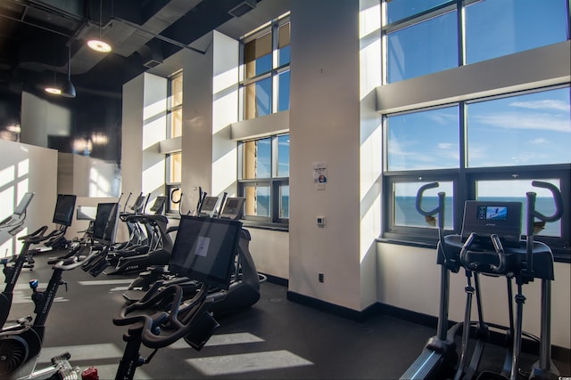 100 N Beach Blvd Unit 1816, North Myrtle Beach, SC 29582 - workout area featuring a high ceiling and plenty of natural light