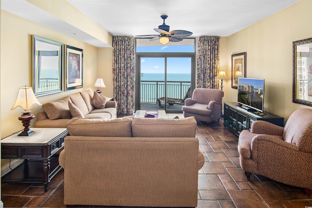 100 N Beach Blvd Unit 1816, North Myrtle Beach, SC 29582 - living room with ceiling fan and stone tile floors