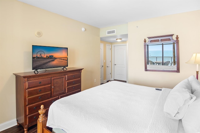 100 N Beach Blvd Unit 1816, North Myrtle Beach, SC 29582 - bedroom with baseboards and dark wood finished floors