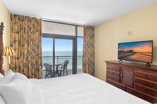 100 N Beach Blvd Unit 1816, North Myrtle Beach, SC 29582 - bedroom with access to exterior and a wall of windows