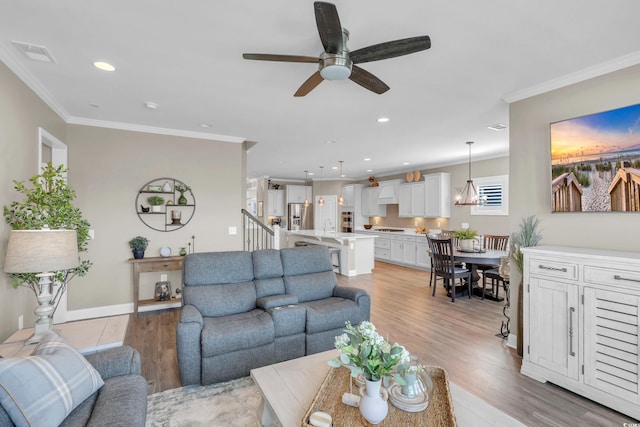1459 Villena Dr, Myrtle Beach, SC 29579 - living room with a ceiling fan, light wood finished floors, ornamental molding, and recessed lighting
