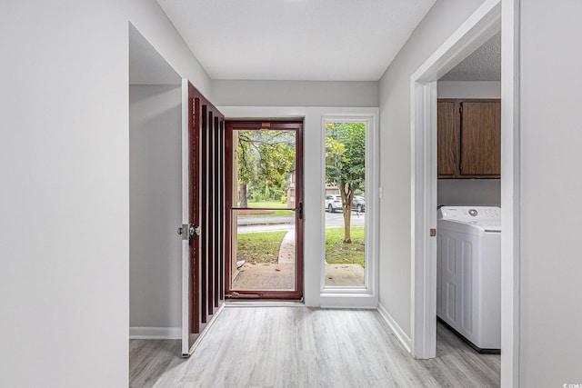 800 Egret Cir Unit 53, Little River, SC 29566 - washroom featuring washer / clothes dryer, cabinet space, and light wood finished floors