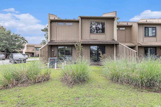 800 Egret Cir Unit 53, Little River, SC 29566 - rear view of property with a lawn