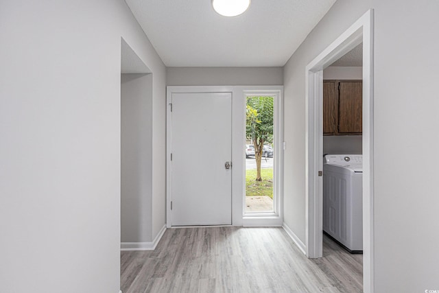 800 Egret Cir Unit 53, Little River, SC 29566 - entrance foyer featuring washer / dryer and light wood-type flooring