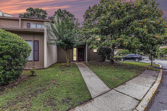 800 Egret Cir Unit 53, Little River, SC 29566 - view of front of property featuring a lawn and stucco siding