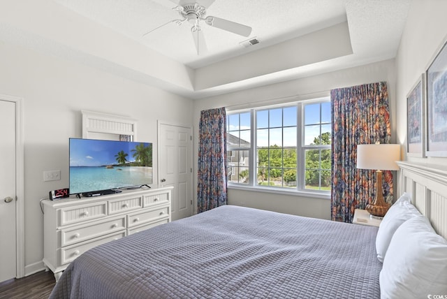 5801 Oyster Catcher Dr Unit 431, North Myrtle Beach, SC 29582 - bedroom with dark wood-type flooring and a ceiling fan