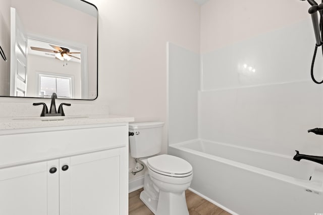 2426 Park St, North Myrtle Beach, SC 29582 - full bathroom featuring vanity, a ceiling fan, wood finished floors, and  shower combination