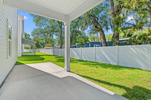 2426 Park St, North Myrtle Beach, SC 29582 - fenced backyard with a patio