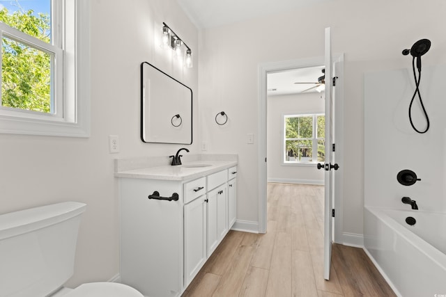 2426 Park St, North Myrtle Beach, SC 29582 - bathroom featuring vanity, wood finished floors, shower / washtub combination, and ceiling fan