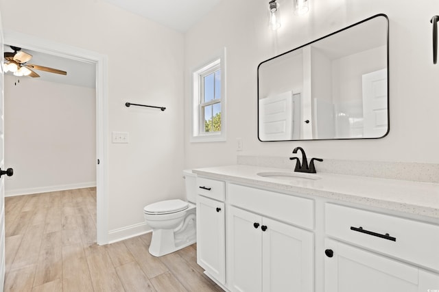 2426 Park St, North Myrtle Beach, SC 29582 - bathroom with vanity, ceiling fan, and wood finished floors