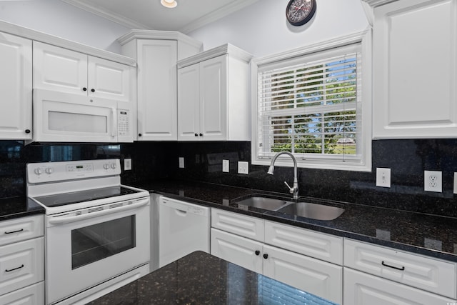 503 20th Ave N Unit 9D, North Myrtle Beach, SC 29582 - kitchen with white appliances, white cabinets, crown molding, backsplash, and dark stone countertops