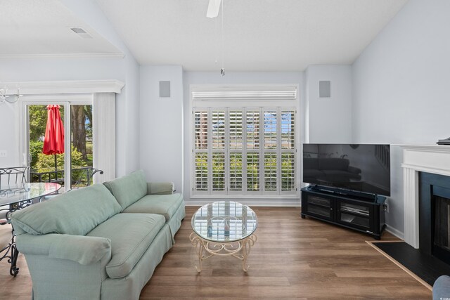 503 20th Ave N Unit 9D, North Myrtle Beach, SC 29582 - living area with wood finished floors, a fireplace, and ceiling fan