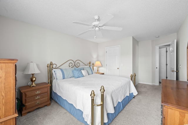 503 20th Ave N Unit 9D, North Myrtle Beach, SC 29582 - bedroom with light carpet, a textured ceiling, and ceiling fan