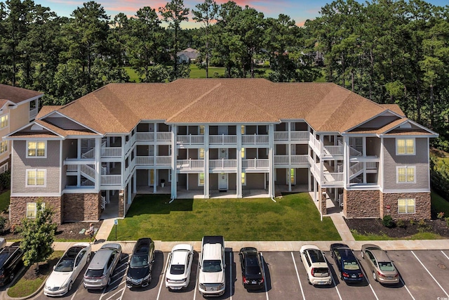 125 S Shore Dr Unit 204, Longs, SC 29568 - view of building exterior featuring uncovered parking