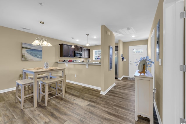 125 S Shore Dr Unit 204, Longs, SC 29568 - dining space featuring dark wood-type flooring, recessed lighting, and a chandelier