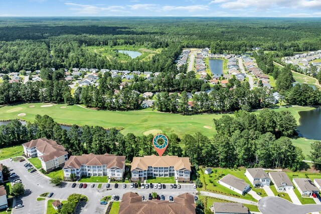 125 S Shore Dr Unit 204, Longs, SC 29568 - view of property's community featuring view of golf course, a water view, view of scattered trees, and a yard