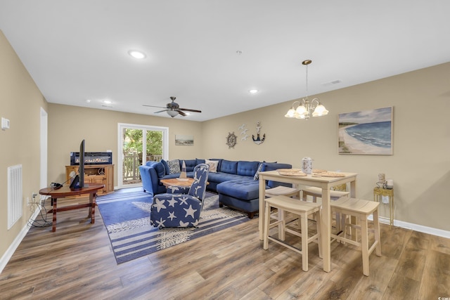 125 S Shore Dr Unit 204, Longs, SC 29568 - living room featuring wood finished floors, a chandelier, ceiling fan, and recessed lighting