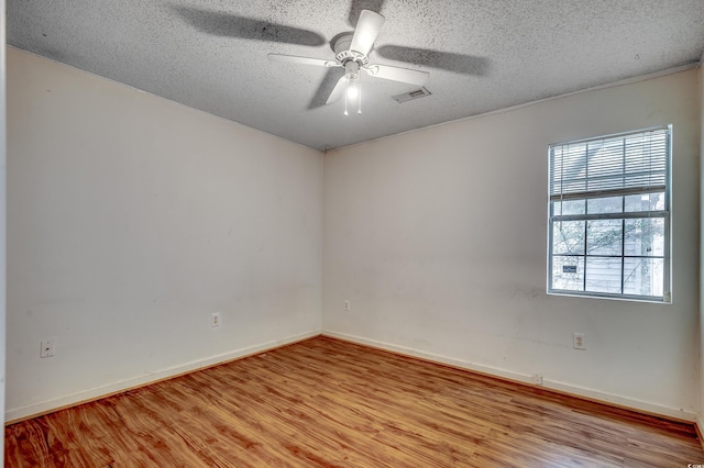 1836 Juniper Dr, Conway, SC 29527 - empty room featuring light wood-type flooring, a ceiling fan, and a textured ceiling