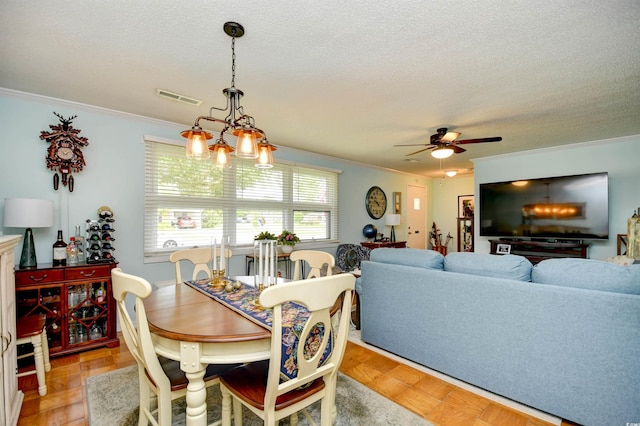 3602 Magnolia St Unit 3602, Myrtle Beach, SC 29577 - dining area with crown molding, a textured ceiling, and a ceiling fan