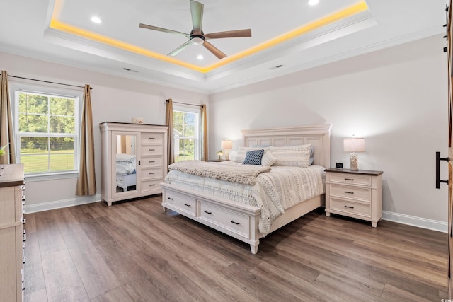 609 Mccown Dr, Conway, SC 29526 - bedroom with a raised ceiling, ornamental molding, dark wood-style floors, recessed lighting, and ceiling fan