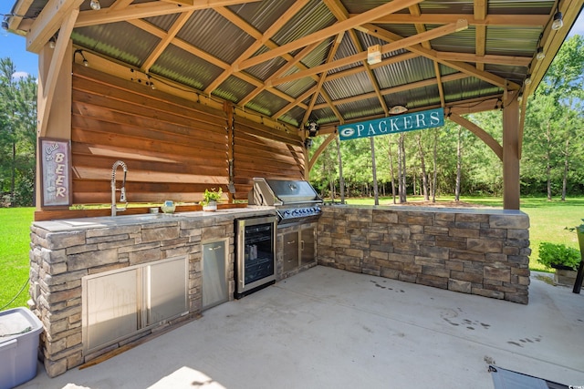 609 Mccown Dr, Conway, SC 29526 - view of patio / terrace with wine cooler, an outdoor kitchen, a gazebo, and a detached carport